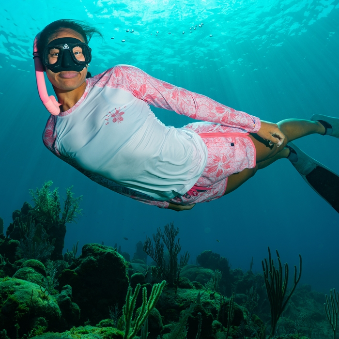 Stacey Baker diving wearing Salt Life Ladies Turtle Watch Long Sleeve Tee SLX SLJ6133 ocean coral