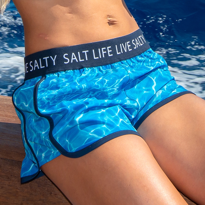 Amber Lewis on a boat wearing Salt Life Calm Waters Ladies Short SLJ4023 Blue 