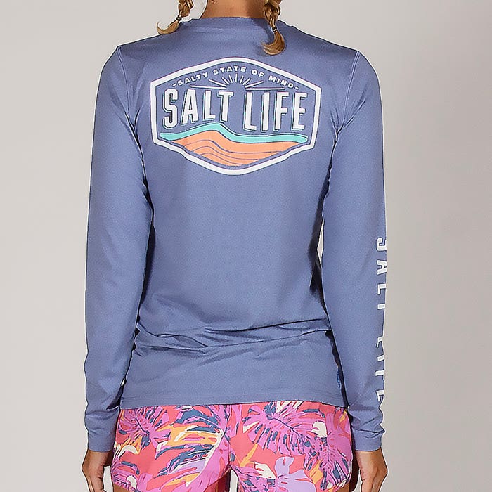Model wearing Salt Life Rays and Waves LS SLX Ladies Tee SLJ6078 Harbor Blue Heather Back