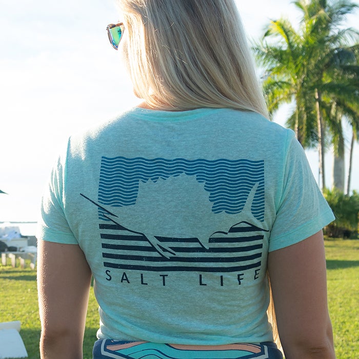 Alex Vandegrift wearing Salt Life Sailin Flag Ladies Tee SLJ10693 Aqua Sea Back