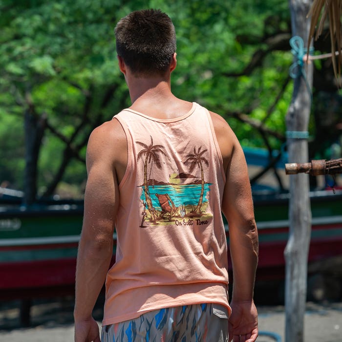 Guy outside wearing Salt Life Island Dreams Tank SLM11042 Papaya 