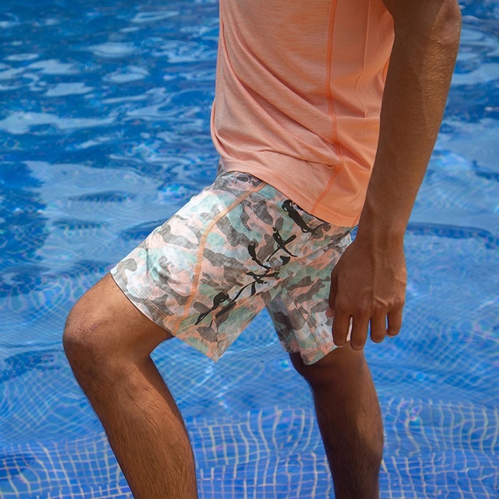 Model wearing Salt Life Into The Abyss Papaya front SLM4059 Side