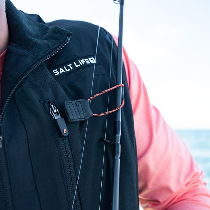 Ryder Devoe on boat wearing Salt Life Venture Mens Vest SLM5002 Black Front Close Up Fishing Pole